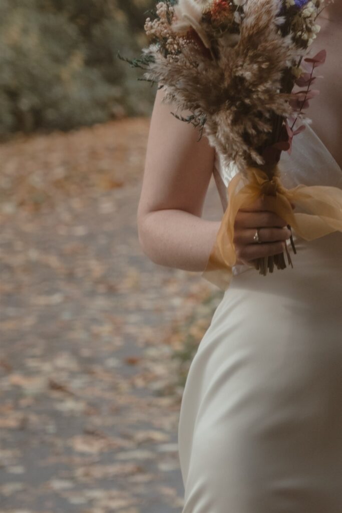 editorial and candid wedding photograph of bride and bouquet, scotland