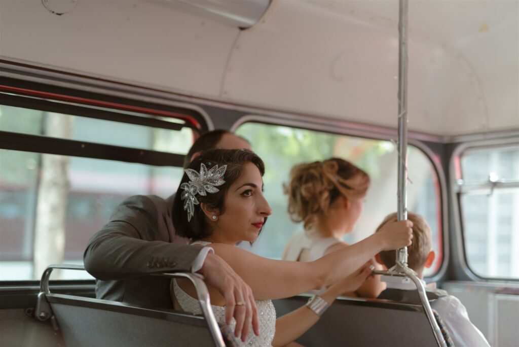 blog wedding bride and groom riding red bus at London wedding