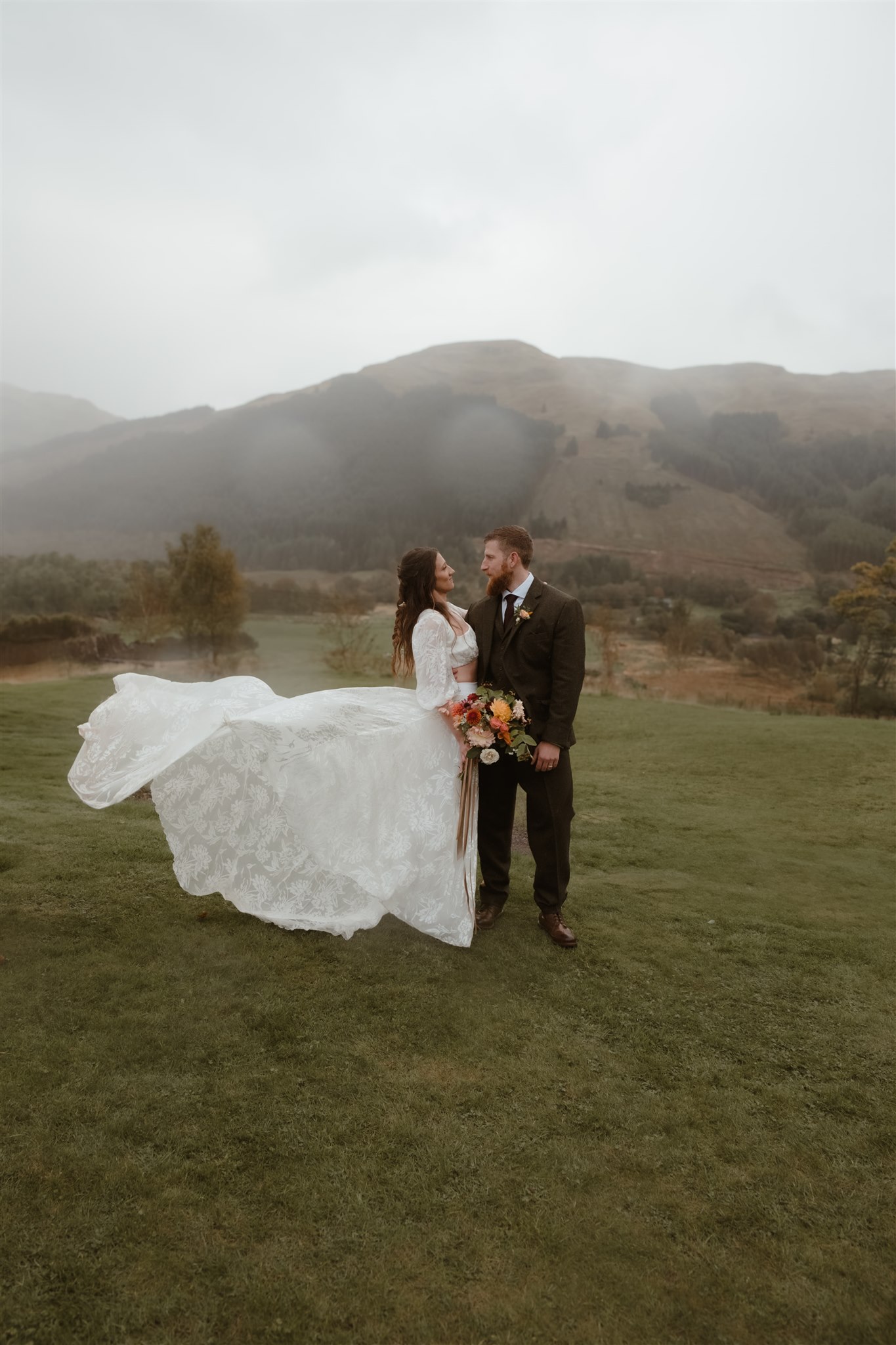 scotland wedding photographer, bride and groom portrait in the rain and wind