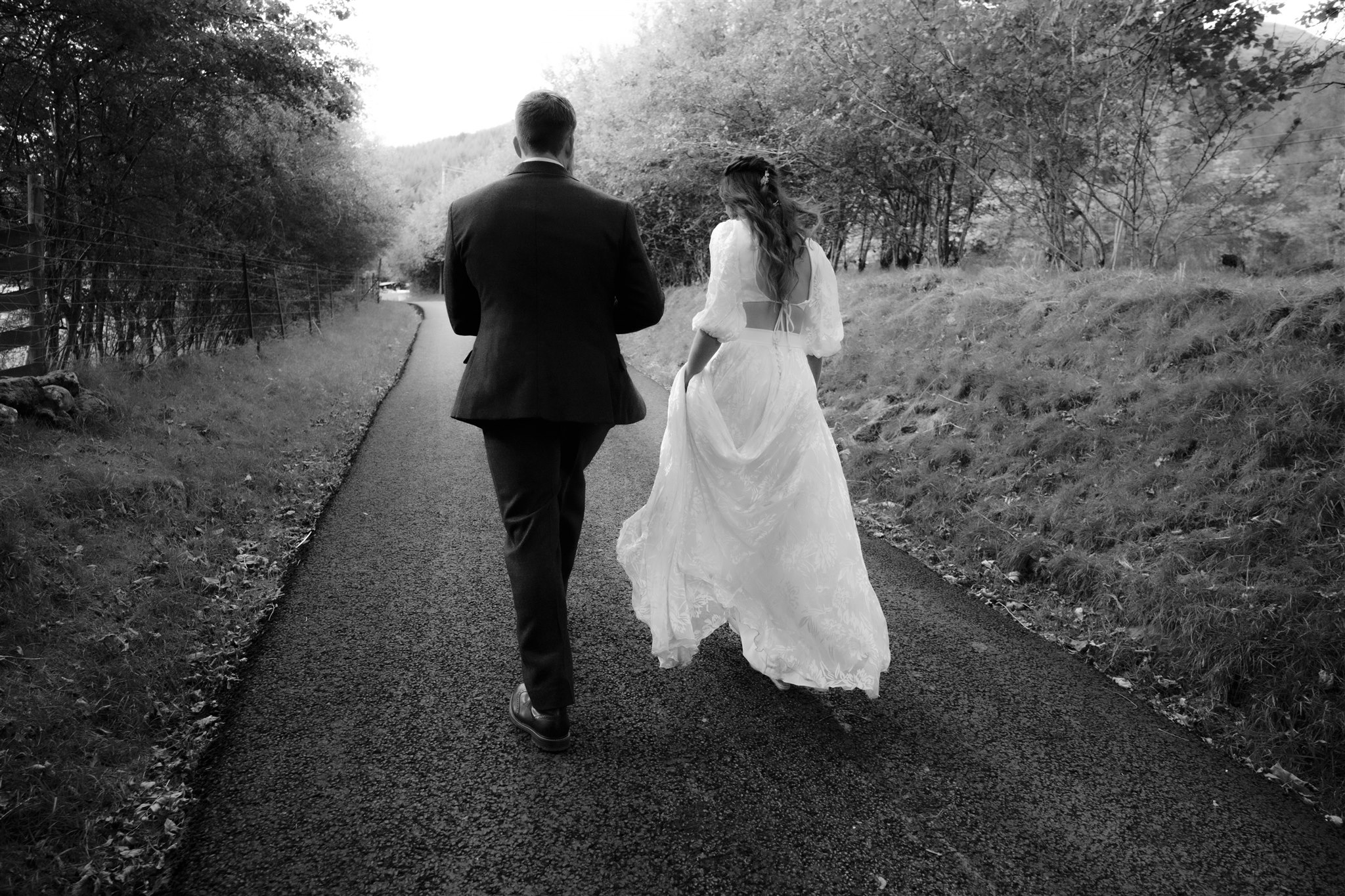 black and white candid portrait of couple at a scottish wedding at monachyle mhor