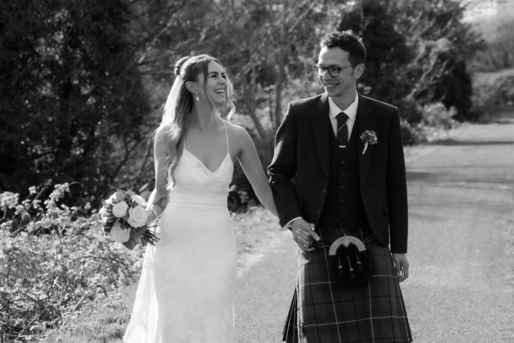 classic black and white photo in a candid way of newlyweds in glasgow